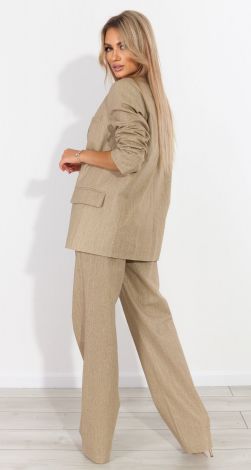 Костюми жіночі