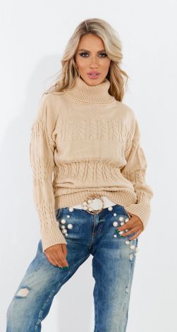 Удлиненный свитер с косами