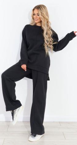 Костюмы женские