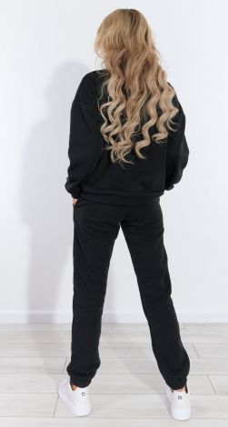 Костюмы женские