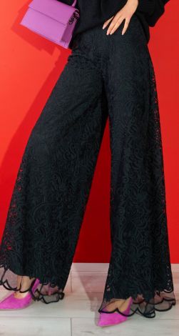 Dressy trousers made of embroidered fabric