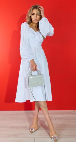 A white dress pleated with a beautiful neckline