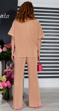 Костюми жіночі