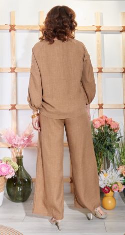 Костюми жіночі