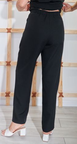 Костюмы женские