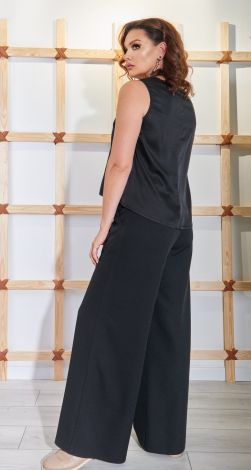 Костюмы женские