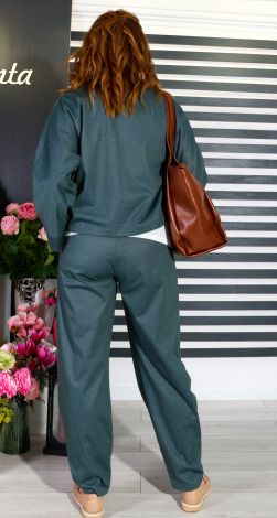 Костюмы женские