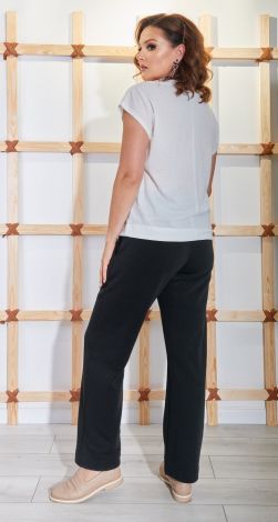 Костюмы женские