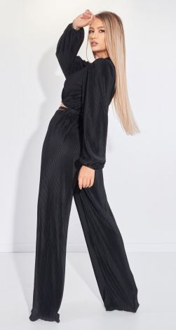 Костюмы женские