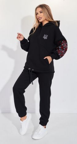 Костюмы женские