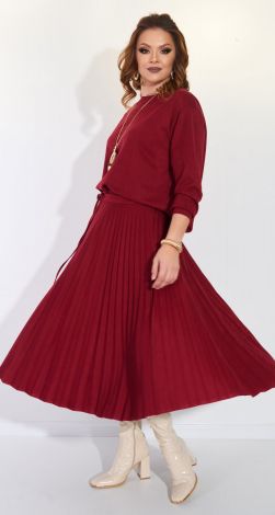 Костюмы женские