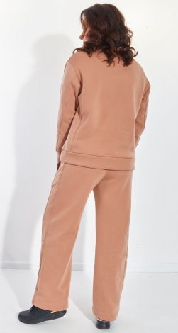 Костюми жіночі