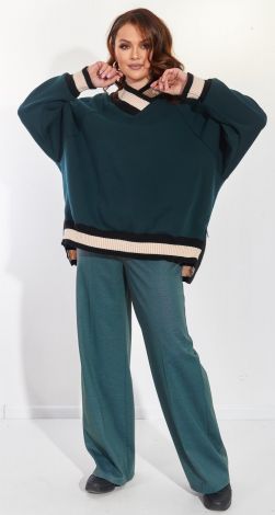 Модный брючный костюм