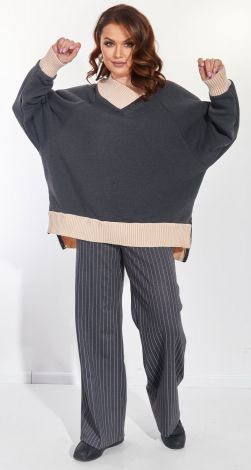 Модный брючный костюм