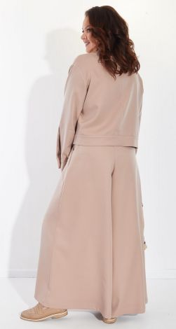 Костюми жіночі