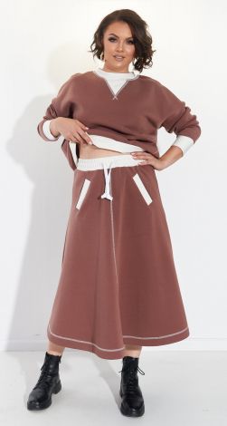 Костюмы женские