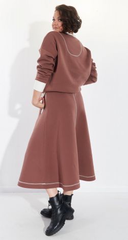 Костюмы женские