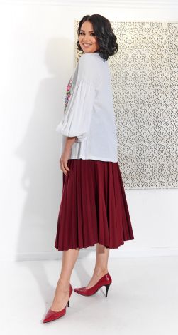 Костюми жіночі