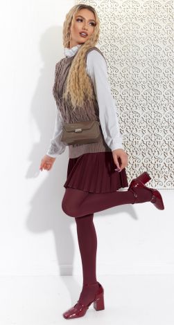 Knitted vest with braids