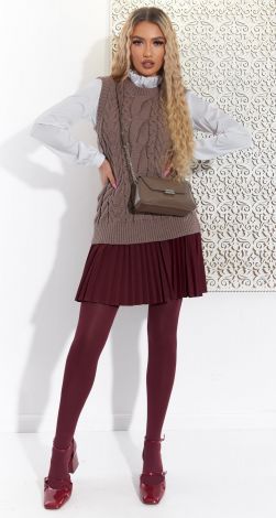 Knitted vest with braids