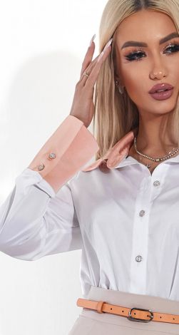 Елегантна біла блузка з акцентними манжетами