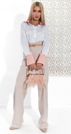 Елегантна біла блузка з акцентними манжетами