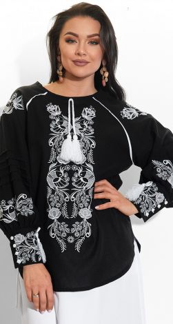 Костюми жіночі