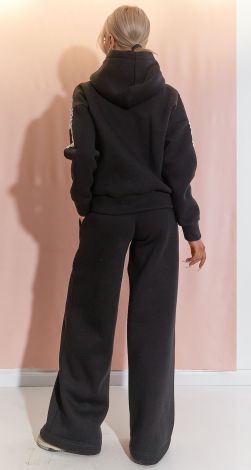 Костюми жіночі