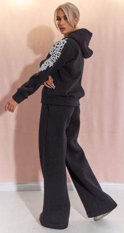 Костюми жіночі