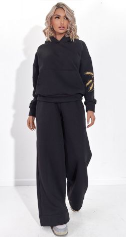 Костюмы женские