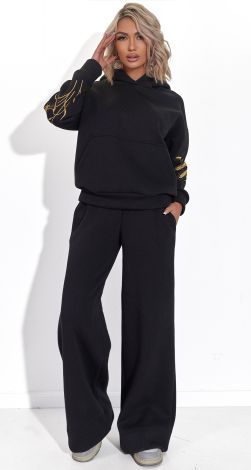 Костюмы женские