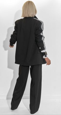 Костюми жіночі