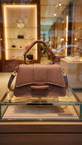 Caramel Mini: Маленький шедевр у кольорі витриманого коньяку