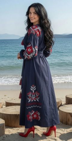 A luxurious blue linen embroidered dress with a rich pattern