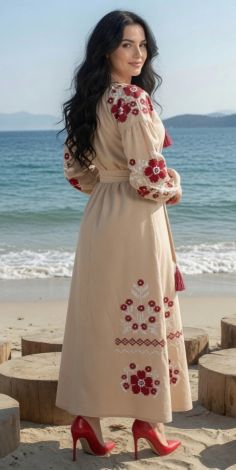 A luxurious beige linen embroidered dress with a rich pattern
