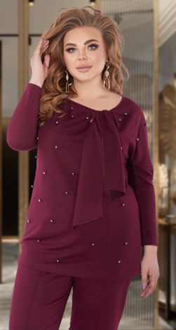 Костюми жіночі