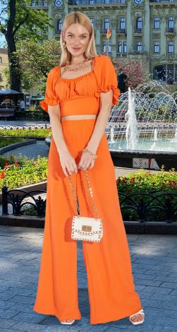 Костюми жіночі