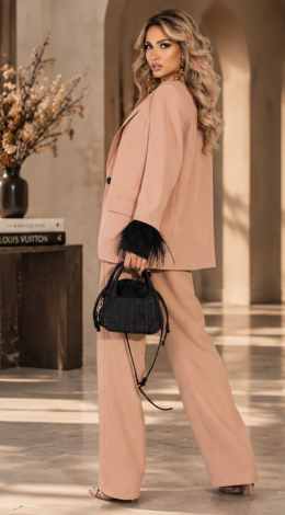 A classic suit with feathers