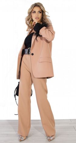 Костюми жіночі